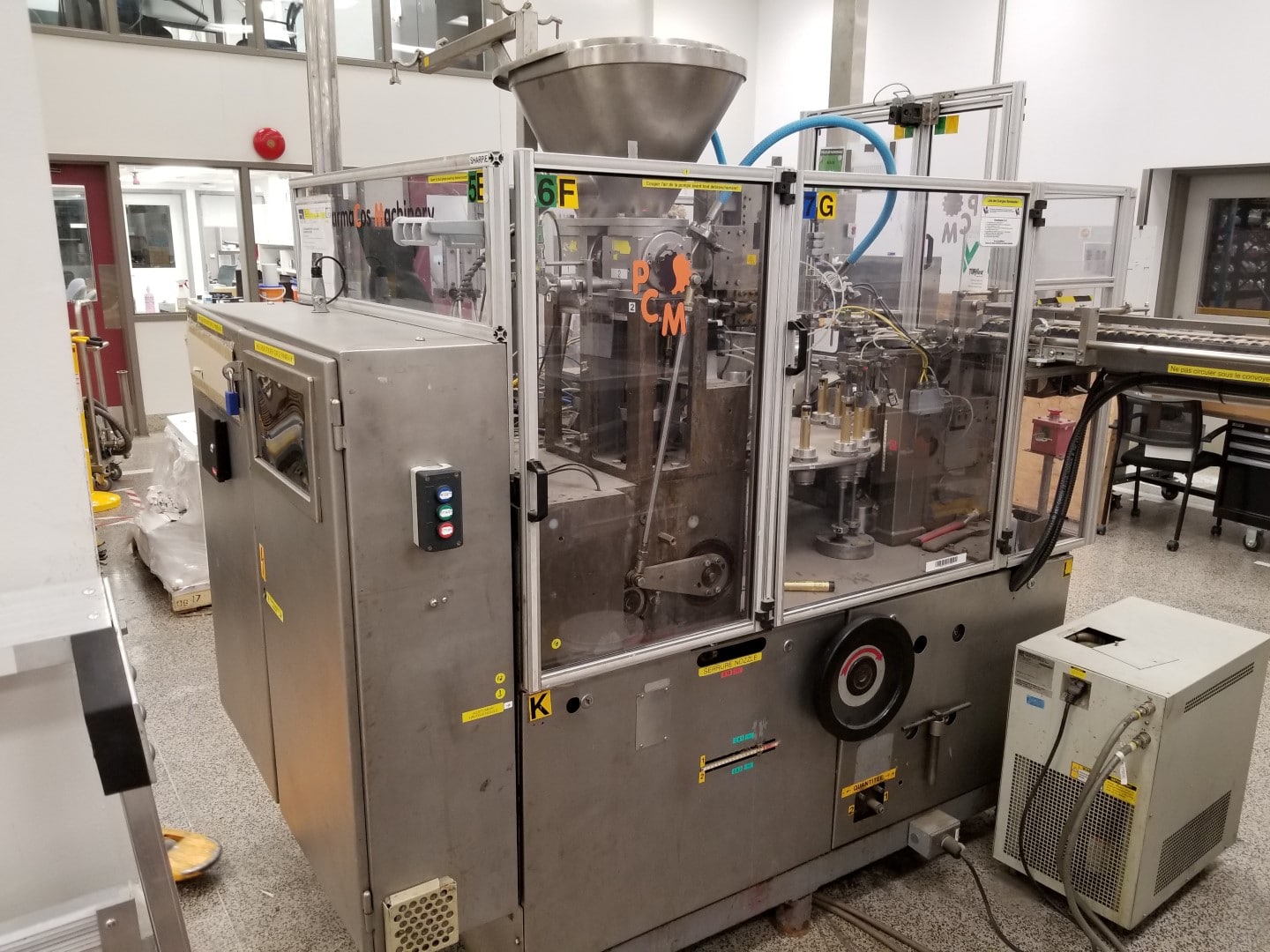 Used IWKA TU200P plastic tube filler with TZ101 tube feeder and LARGE cabinet with MANY parts