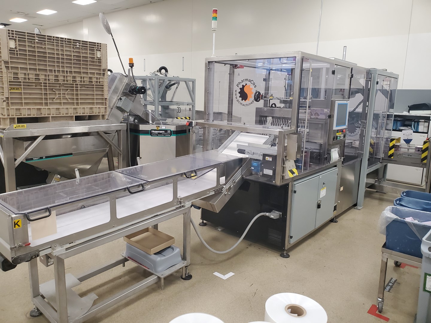 Used PCM robotic feeder with ABB IRB360 robot, vision system and re-circulating conveyor