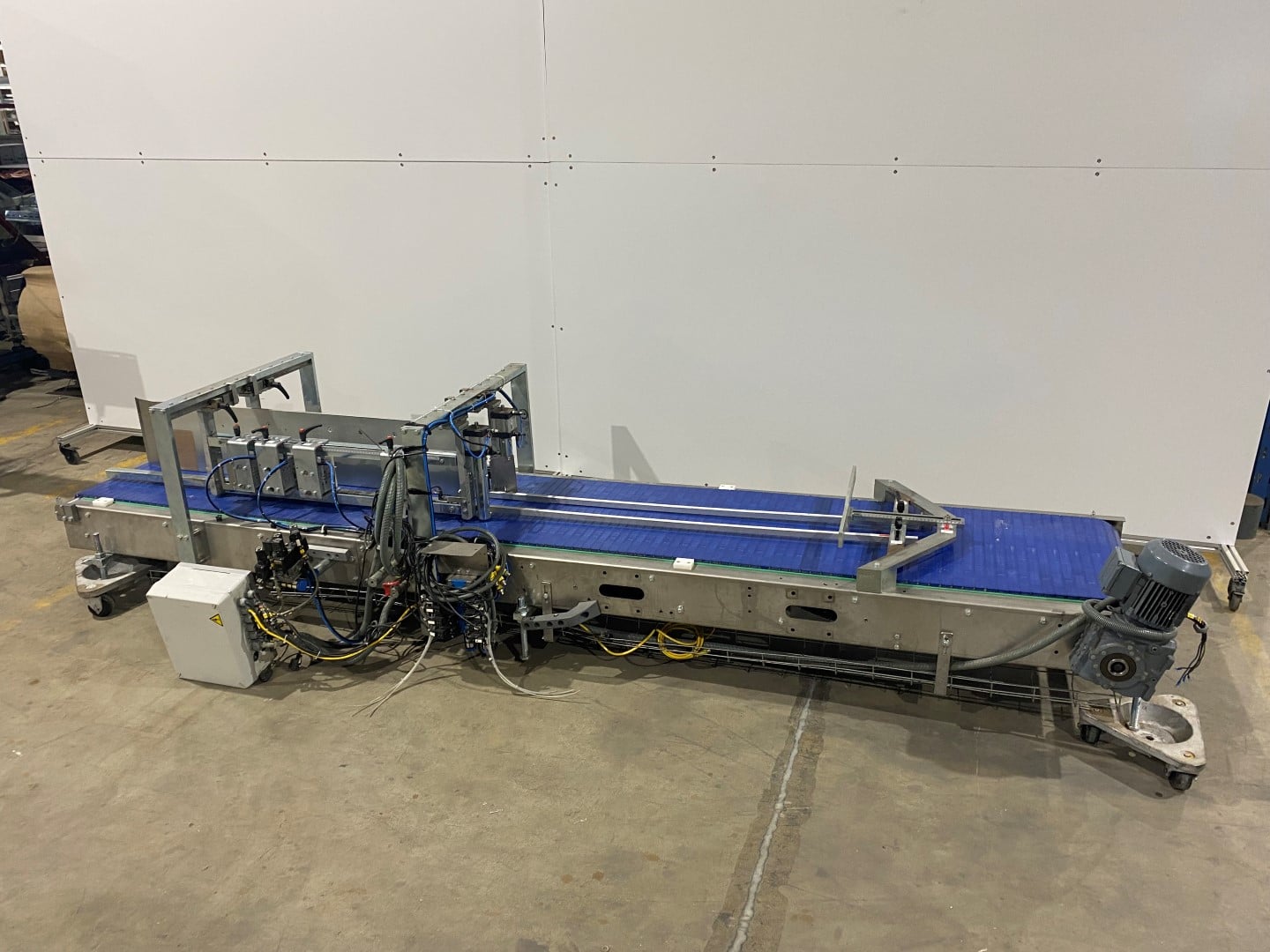 Used 21in wide x 130in long chain conveyor with product deviator separator
