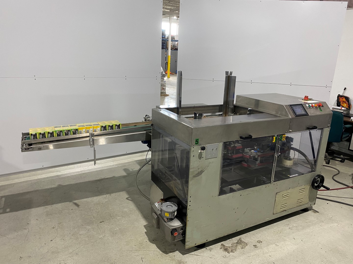 Used PRB Super Pocket automatic horizontal side loading case packer